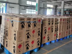 Side view of FOKIS' bulk industrial adhesive order customized for the brand "555" on pallets, demonstrating our strong capability in providing customized production solutions for major customers.